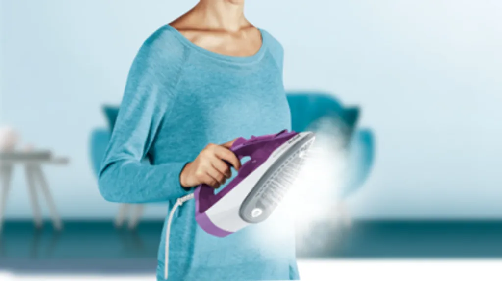 Tefal FV2836 Trocken- & Dampfbügeleisen Keramik-Bügelsohle 2400 W Violett, Weiß 7 Tefal FV2836 Trocken- & Dampfbügeleisen Keramik-Bügelsohle 2400 W Violett, Weiß – Bild 5